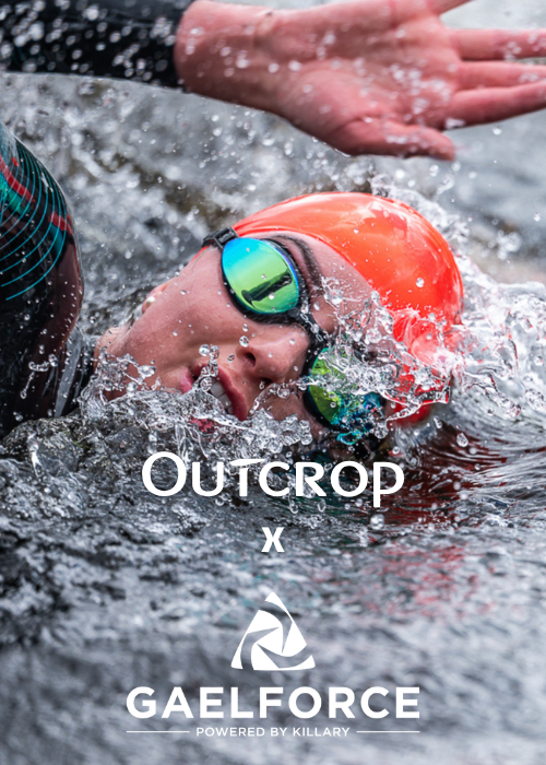 Outcrop collaborating with Gaelforce logos over close up of swimmer in Killary Fjord