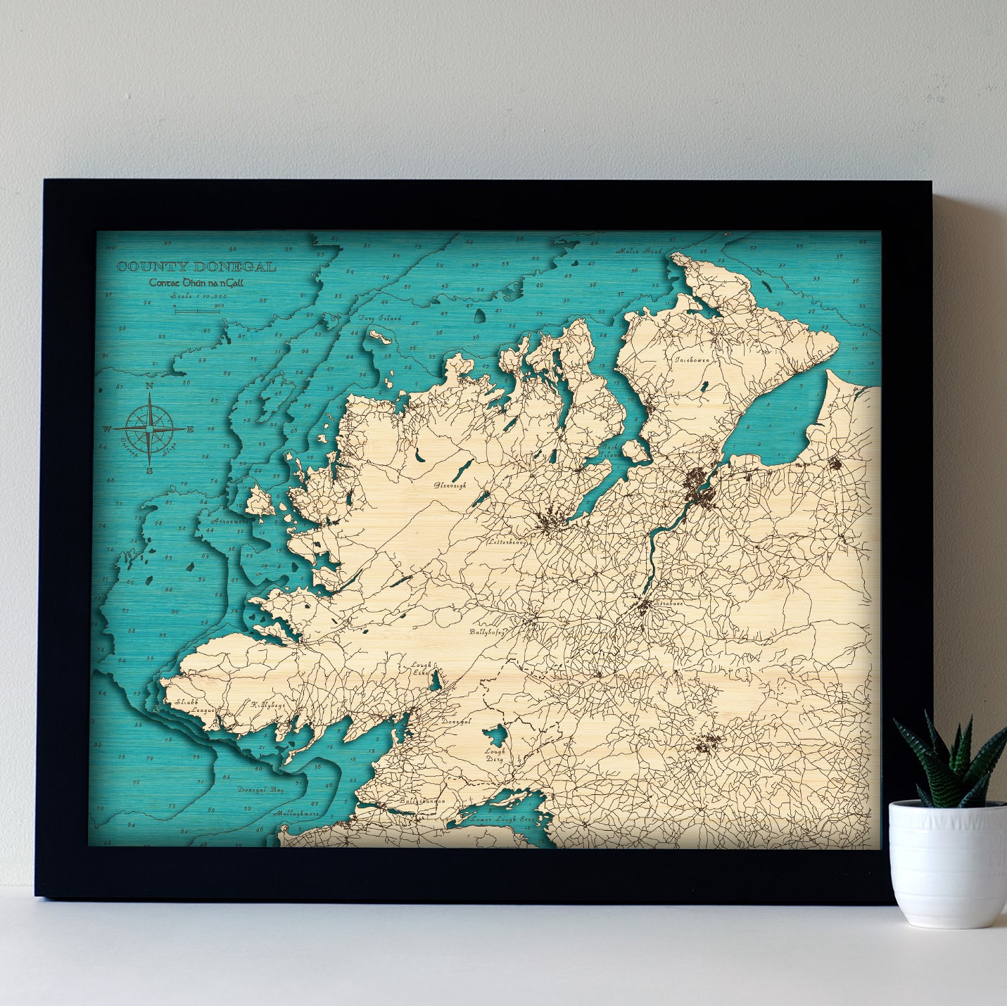 Handcrafted 3D wooden map of County Donegal by Outcrop, featuring the Rosguill Peninsula in layered sustainable bamboo, with Atlantic blue detailing and an optional personalisation available